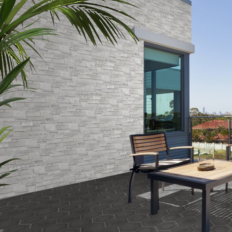 Patio wall clad in Marmi White interlocking porcelain wall panels with an outside mitered corner