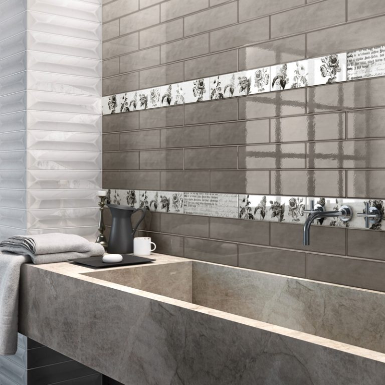 Bathroom with Imagine 4x16 Greige glossy wall tile and a stone trough sink