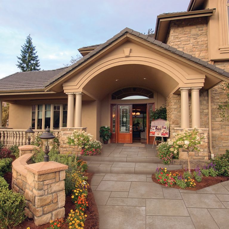 House entry with a Light Coffee Limestone porcelain paver walkway
