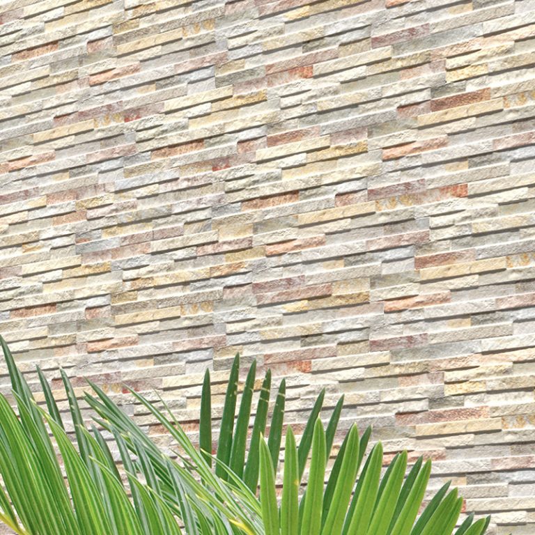 Close-up of Natura Tropical stone-look interlocking porcelain wall panels with palm fronds