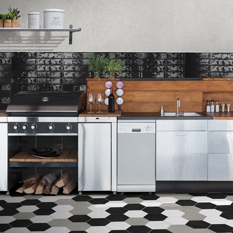 Kitchen with a Colors Black brick tile backsplash and a black, white and greige hexagon tile floor