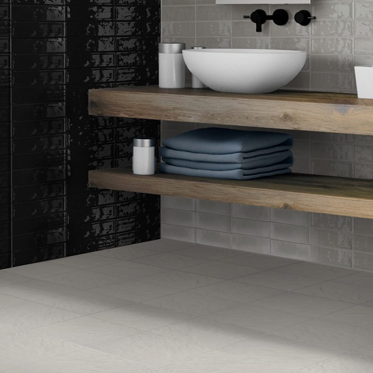 Bathroom with a Colors 9-7/8x9-7/8 Greige porcelain floor and wood floating shelves