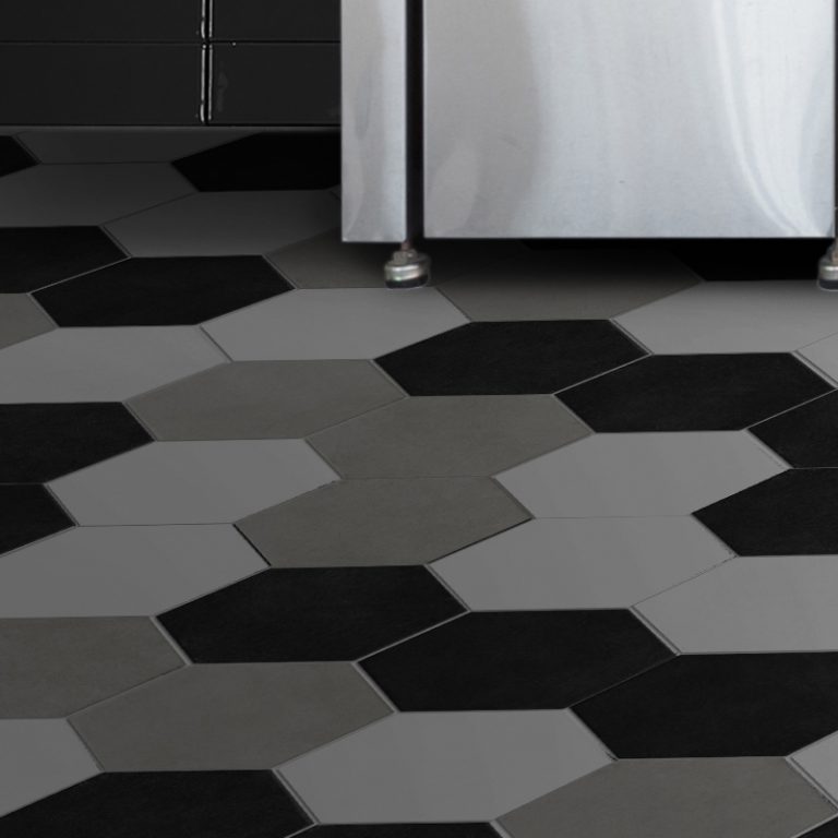 Colors black, white and greige hexagon tile floor beside a stainless steel appliance