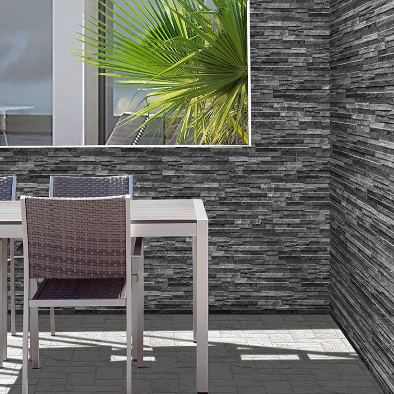 Patio corner in Natura Lava stone-look interlocking porcelain wall panels with an inside mitered corner