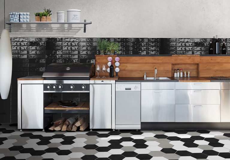 Kitchen with a Colors Black brick tile backsplash and a black, white and greige hexagon tile floor