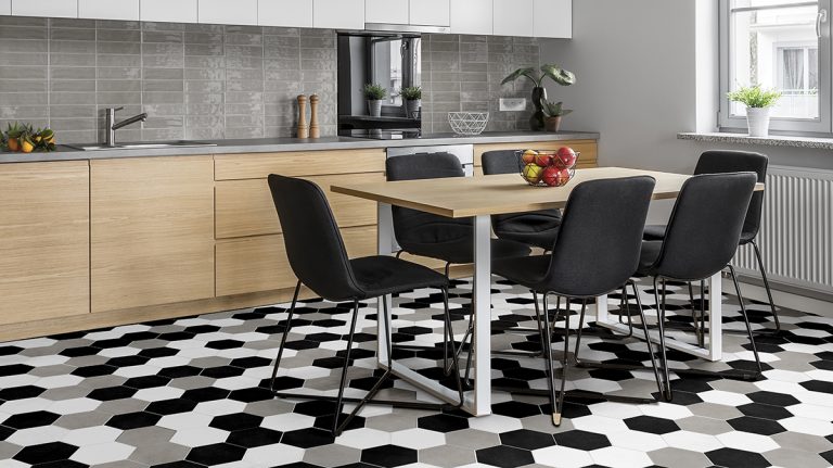 Kitchen with a Colors black, white and greige hexagon tile floor and a Colors Greige brick tile backsplash
