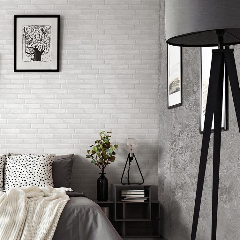 Bedroom with a Colors 2-3/8x9-7/8 White brick tile wall and a floor lamp