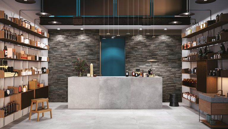 Wine shop with a Volcano 6x24 Dark cement-look wall panel feature wall behind the counter