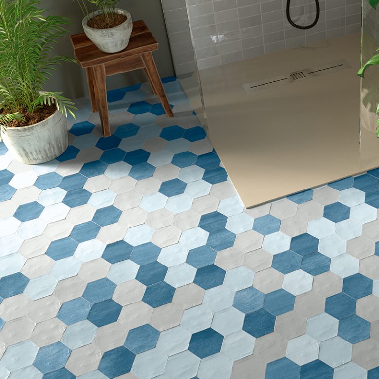 Bathroom floor in Switch 4x4-1/2 hexagon tile mixing Dark Blue and White