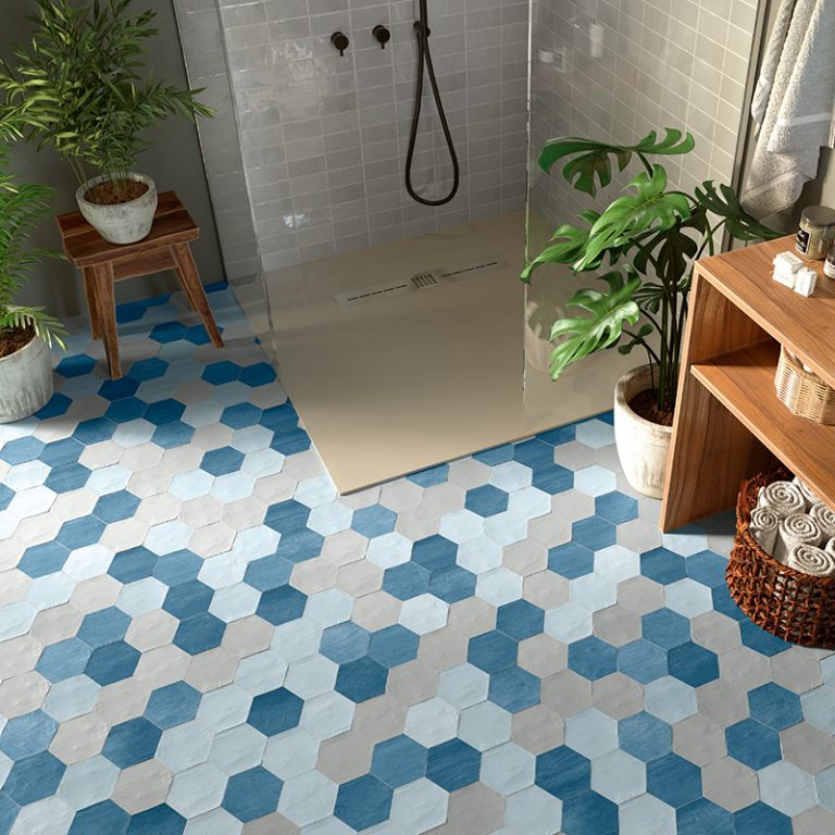 Walk-in shower with a Switch 4x4-1/2 Blue and White hexagon tile floor
