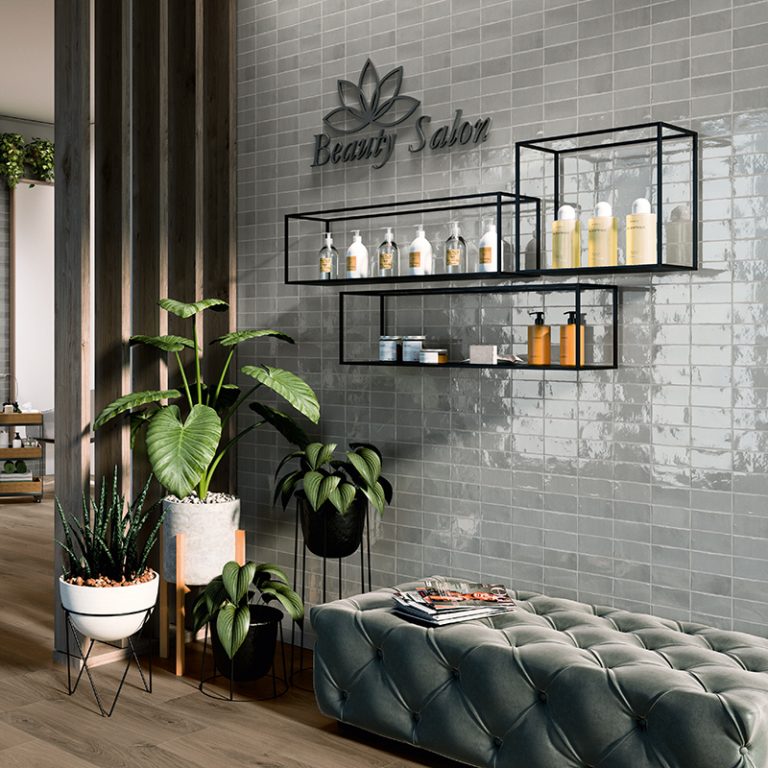 Beauty salon wall in Switch 2-1/2x5 Gray glossy wall tile with a sign and shelves