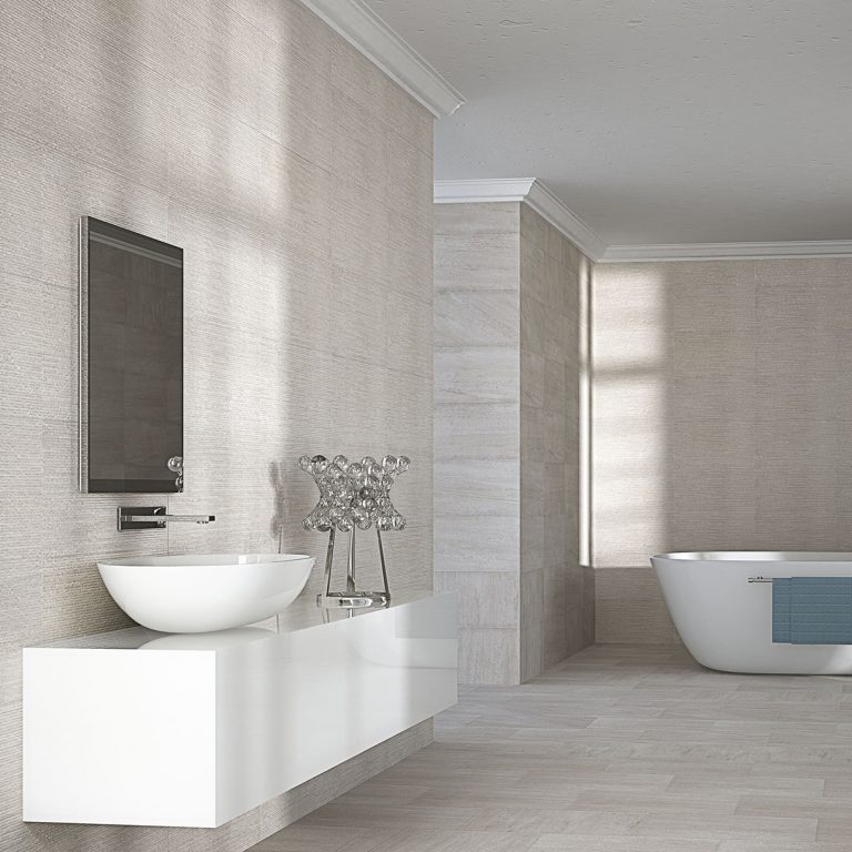 Bathroom with Ontario 12x22 Gris raked stone-look wall panels behind a vessel sink