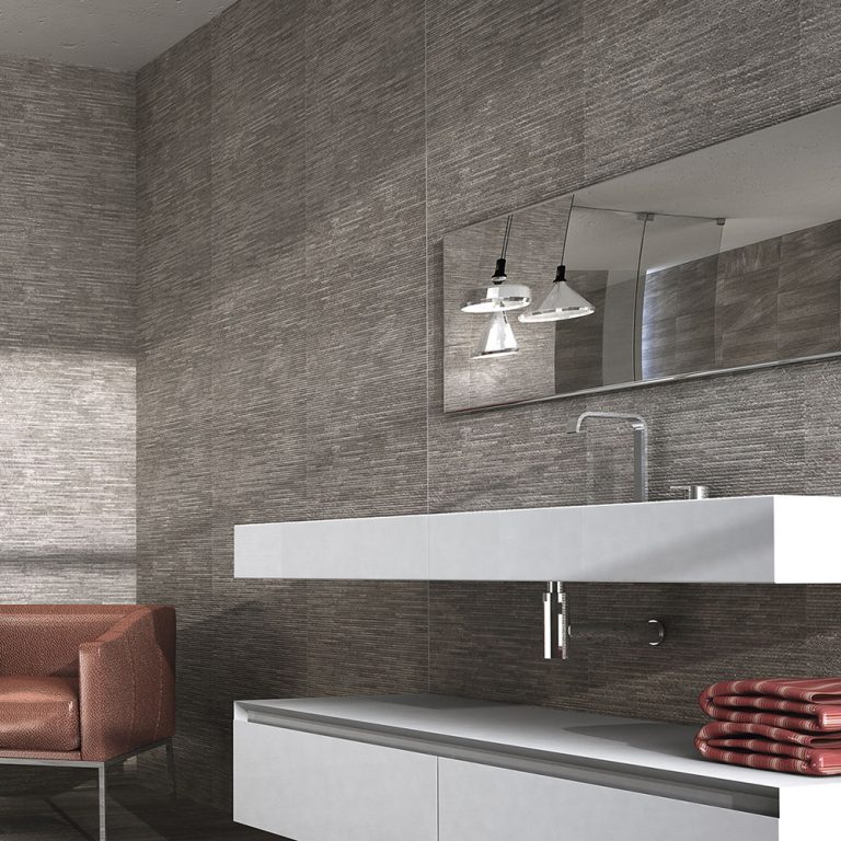 Bathroom with Ontario 12x22 Antracita raked stone-look wall panels behind a floating vanity