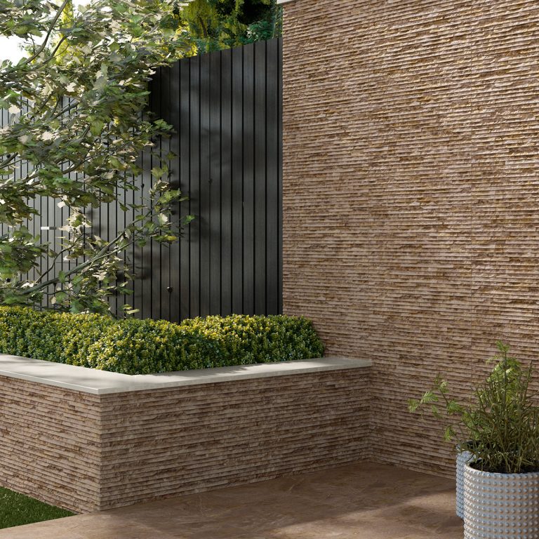Raised planter clad in Iguazu 8x25 Terra raked stone-look wall panels with outside mitered corners