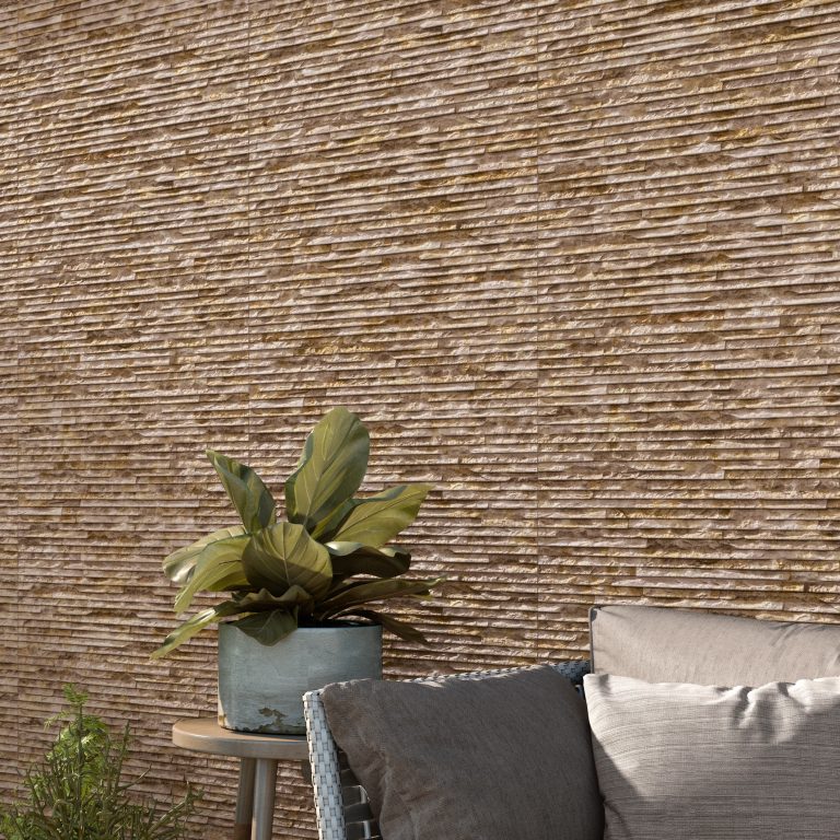 Patio wall in Iguazu 8x25 Terra raked stone-look wall panels behind outdoor seating