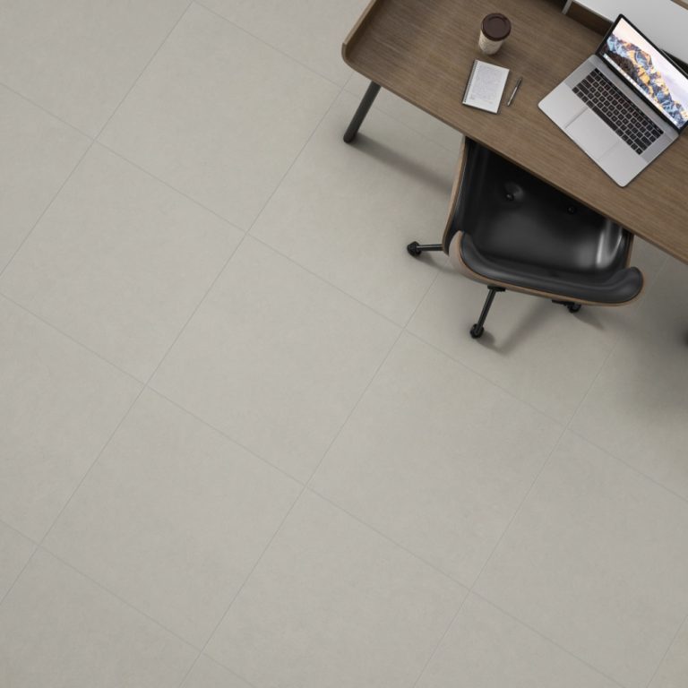 Overhead view of a Eureka 12x24 Light Gray porcelain tile floor in a home office