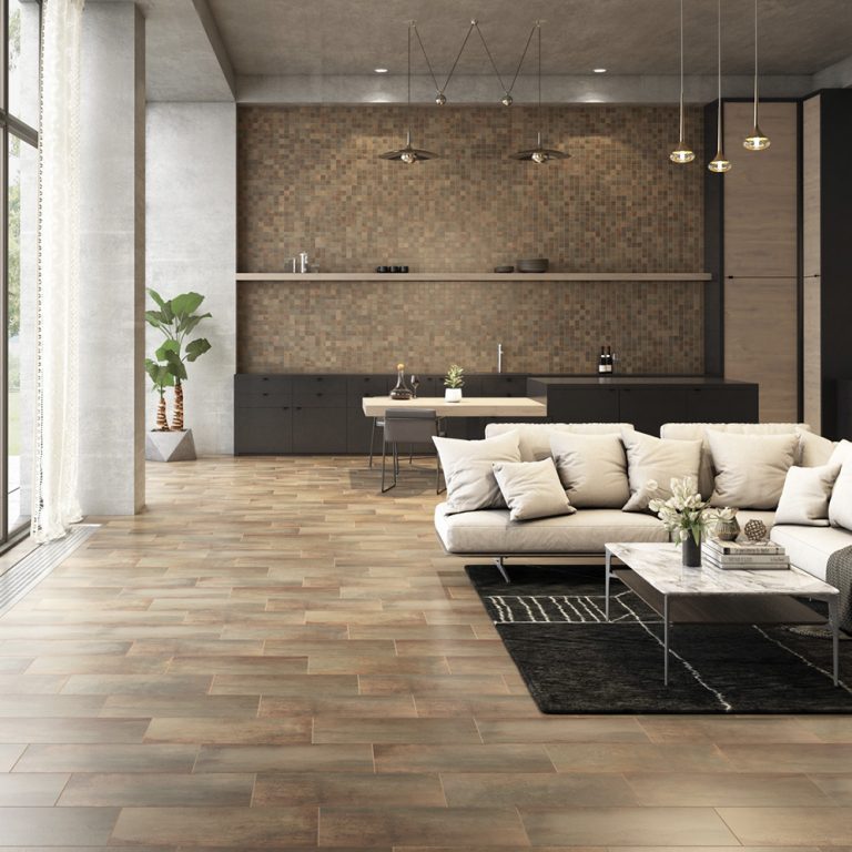 Open living area with Midtown 12x24 Iron Oxide porcelain tile on the floor and a feature wall
