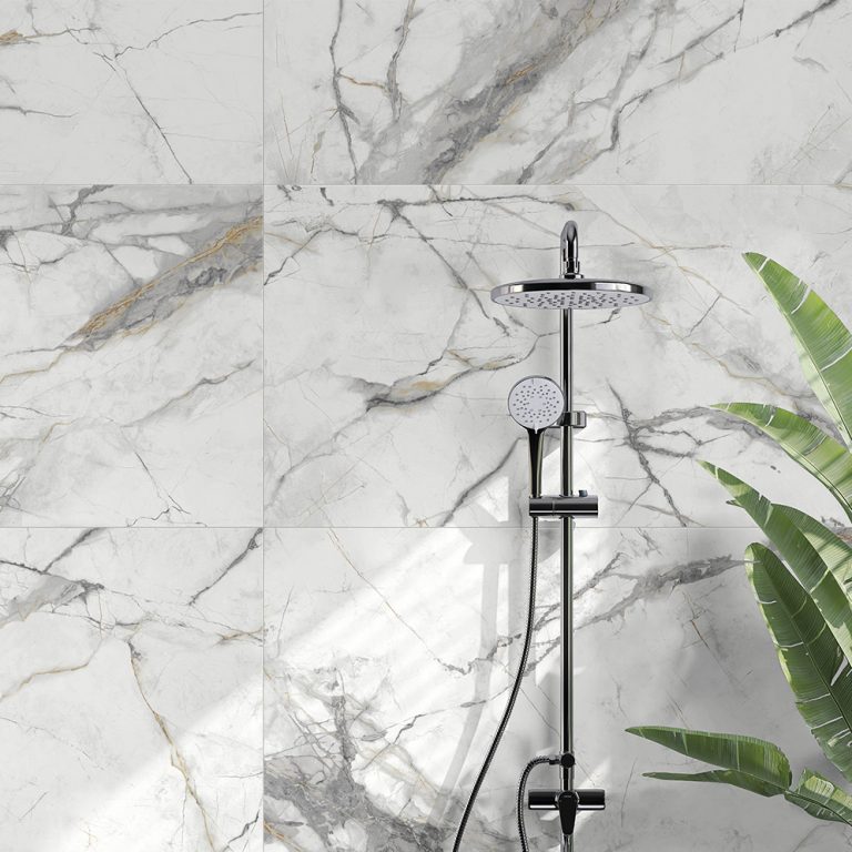 Shower wall in Invisible Gold 24x48 marble-look porcelain tile with a black shower column
