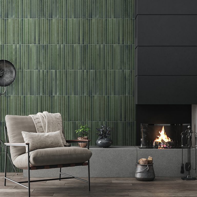 Fireplace wall in Posh Pitch 3D green glossy porcelain tile with a lounge chair