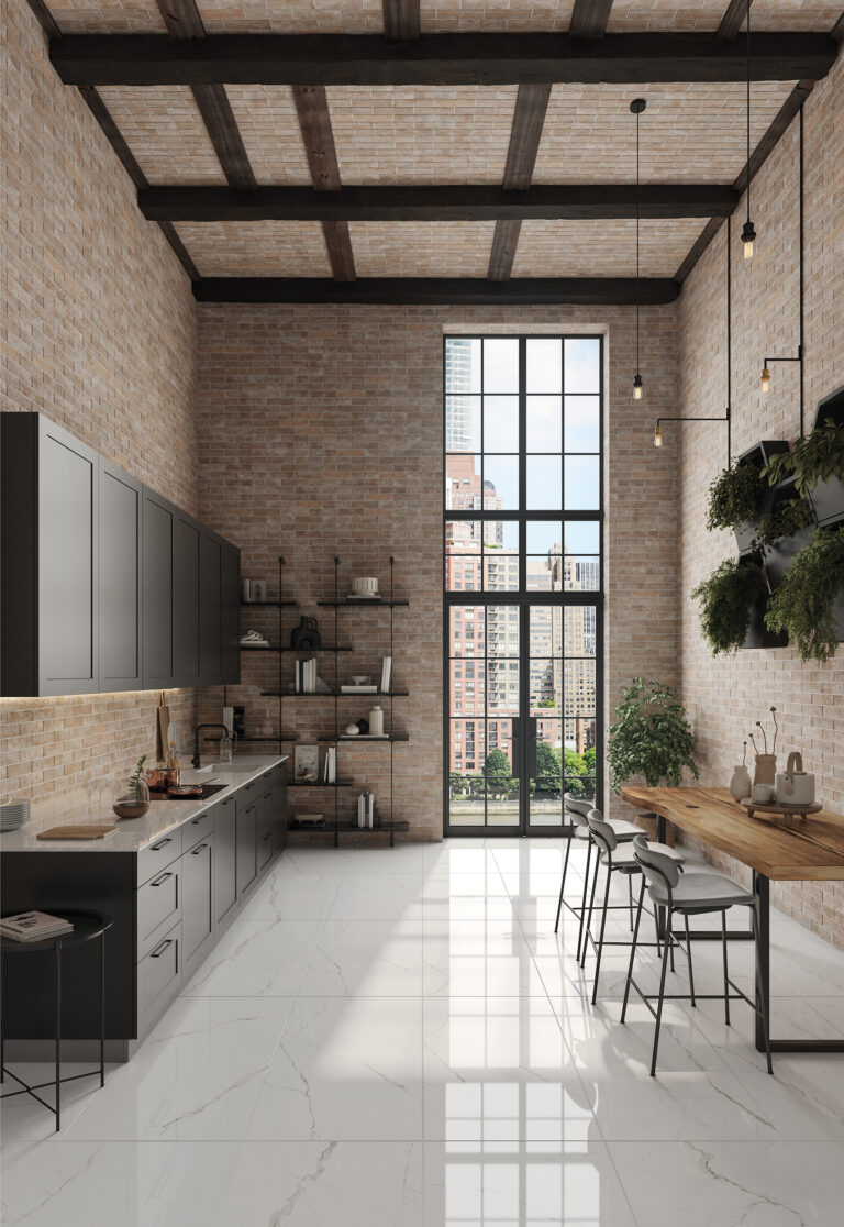 Loft kitchen with Brickhouse Buff brick walls, tall steel windows and a white polished floor