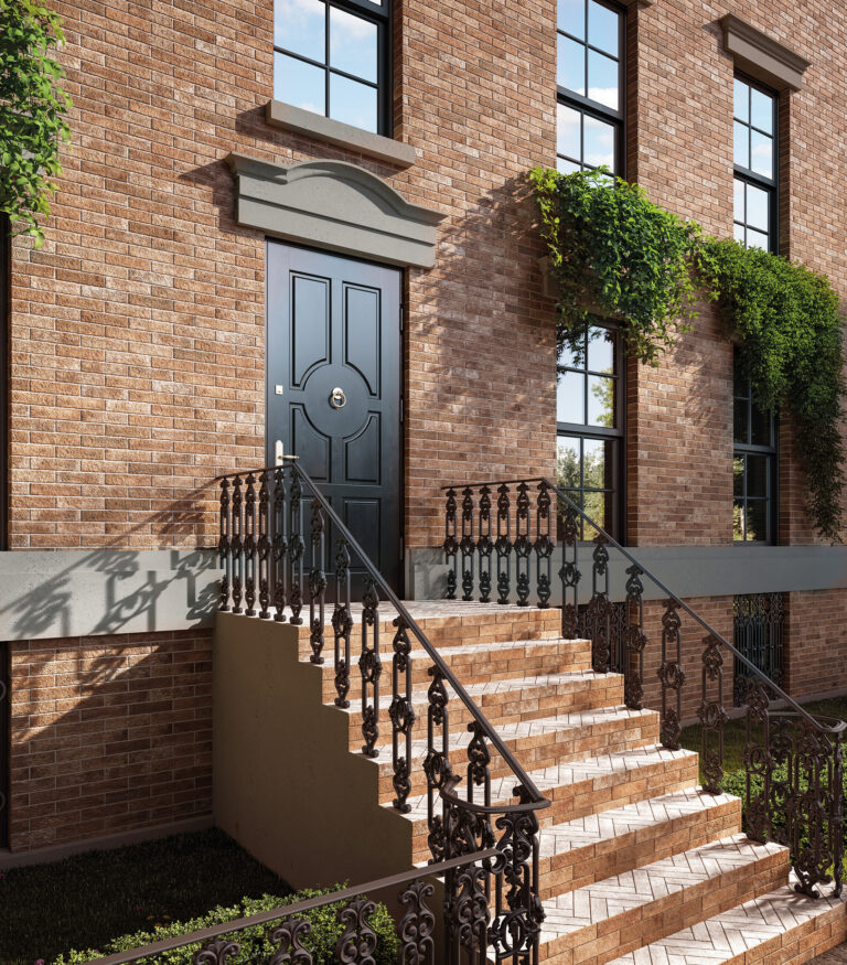 Townhouse entry with Brickhouse Classic red brick and a black front door